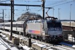 Westbound commuter shoves out of the station